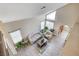 High-ceiling living room with light colored couches at 9636 Swan Bay Dr, Las Vegas, NV 89117