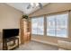 Home office featuring built-in shelving, hardwood floors, and a ceiling fan at 9636 Swan Bay Dr, Las Vegas, NV 89117