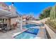 Private pool with spa and patio seating at 9636 Swan Bay Dr, Las Vegas, NV 89117