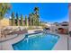 Relaxing pool area with landscaping and seating at 9636 Swan Bay Dr, Las Vegas, NV 89117