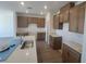 Well-lit kitchen showcases white countertops, grey cabinets, and stainless steel sink at 10039 Sir Atlas Ct, Las Vegas, NV 89148