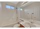 Main bathroom with shower/tub combo and single sink vanity at 10201 Premia Pl, Las Vegas, NV 89135