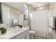 Clean bathroom with white vanity and bathtub at 10286 Jade Gardens Dr, Las Vegas, NV 89135