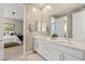 Double vanity bathroom with view into bedroom at 10286 Jade Gardens Dr, Las Vegas, NV 89135