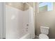 Clean bathroom with shower/tub combo and tile at 10286 Jade Gardens Dr, Las Vegas, NV 89135