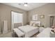 Spacious bedroom with a comfortable bed and plenty of natural light at 10286 Jade Gardens Dr, Las Vegas, NV 89135