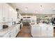 Spacious kitchen with white cabinets, marble countertops, and stainless steel appliances at 10286 Jade Gardens Dr, Las Vegas, NV 89135