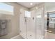 Large walk-in shower with glass enclosure and modern fixtures at 10286 Jade Gardens Dr, Las Vegas, NV 89135