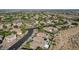 Aerial view of homes and neighborhood landscape at 10509 India Hawthorn Ave, Las Vegas, NV 89144