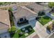 Aerial view of house with landscaped front yard at 10509 India Hawthorn Ave, Las Vegas, NV 89144