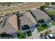 Aerial view of houses with solar panels and landscaped yards at 10509 India Hawthorn Ave, Las Vegas, NV 89144