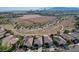 Aerial view showcasing a community with desert landscape at 10509 India Hawthorn Ave, Las Vegas, NV 89144