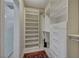 Large walk-in closet with custom shelving and drawers at 10509 India Hawthorn Ave, Las Vegas, NV 89144