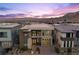 Modern home with yellow garage door and city views at 10955 Mojave Spring Dr, Las Vegas, NV 89135