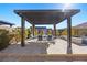 Covered patio with seating area and mountain views at 10955 Mojave Spring Dr, Las Vegas, NV 89135