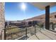 Private balcony showcasing stunning mountain and community views at 10955 Mojave Spring Dr, Las Vegas, NV 89135