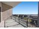 A balcony with glass railing and mountain views at 10955 Mojave Spring Dr, Las Vegas, NV 89135