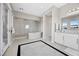 Spa-like bathroom with marble shower and soaking tub at 10955 Mojave Spring Dr, Las Vegas, NV 89135