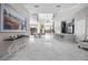 Bright entryway with marble floors and view into the living area at 10955 Mojave Spring Dr, Las Vegas, NV 89135