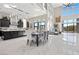 Open concept kitchen and dining area with marble floors at 10955 Mojave Spring Dr, Las Vegas, NV 89135