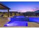 Relaxing pool and spa with blue tile and pergola at 10955 Mojave Spring Dr, Las Vegas, NV 89135