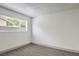 Simple bedroom with grey carpet and window at 145 Hancock St, Las Vegas, NV 89110