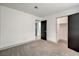 Bedroom with grey carpet and large closet at 145 Hancock St, Las Vegas, NV 89110