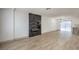 Living room features a modern fireplace and light wood floors at 145 Hancock St, Las Vegas, NV 89110