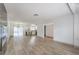 Bright and airy living room with hardwood floors and fireplace at 145 Hancock St, Las Vegas, NV 89110