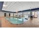 Indoor pool and seating area with city views at 211 E Flamingo Rd # 615, Las Vegas, NV 89169