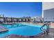 Rooftop pool with lounge chairs and city views at 211 E Flamingo Rd # 615, Las Vegas, NV 89169