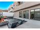 Modern backyard pool and spa with built-in fire features and sleek lounge chairs at 220 Glen Lee St, Henderson, NV 89012