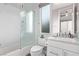 Clean bathroom with walk-in shower and bathtub at 220 Glen Lee St, Henderson, NV 89012