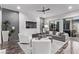 Spacious living area featuring modern furniture and a marble accent wall at 220 Glen Lee St, Henderson, NV 89012