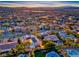 Wide view of house and neighborhood at sunset at 2412 Templi Scotia St, Henderson, NV 89044