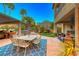 Outdoor patio area with seating and fountain at 2412 Templi Scotia St, Henderson, NV 89044