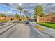 Gated entrance to Edinburgh community with palm trees and landscaping at 2412 Templi Scotia St, Henderson, NV 89044