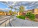 Gated community entrance with landscaping at 2412 Templi Scotia St, Henderson, NV 89044