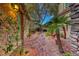 Brick pathway leads to a peaceful courtyard oasis at 2412 Templi Scotia St, Henderson, NV 89044