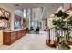 Bright entryway with hardwood staircase, high ceilings, and decorative accents at 2412 Templi Scotia St, Henderson, NV 89044