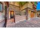 Ornate iron gate and walkway to inviting front door at 2412 Templi Scotia St, Henderson, NV 89044