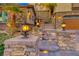 Elegant entryway with stone pillars and lighting at 2412 Templi Scotia St, Henderson, NV 89044