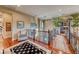 Upstairs hallway with hardwood floors and ornate railing at 2412 Templi Scotia St, Henderson, NV 89044