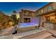 Relax in this luxurious hot tub under the stars at 2412 Templi Scotia St, Henderson, NV 89044