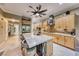 Spacious kitchen with stainless steel appliances and large island at 2412 Templi Scotia St, Henderson, NV 89044