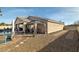 Beautiful backyard featuring a pool, patio, gazebo, and low-maintenance landscaping at 2540 E Sparrow Way, Pahrump, NV 89048