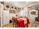Cozy dining area features a wood table with seating for four beneath decorative wall decor at 2540 E Sparrow Way, Pahrump, NV 89048