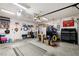 Spacious garage with ample storage, shelving, and a refrigerator for organization and convenience at 2540 E Sparrow Way, Pahrump, NV 89048
