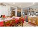 Open concept kitchen and dining area featuring stainless steel appliances and ample counter space at 2540 E Sparrow Way, Pahrump, NV 89048