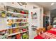 Walk-in pantry features ample shelving and storage space for food and kitchen essentials at 2540 E Sparrow Way, Pahrump, NV 89048